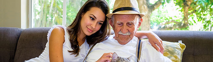 Photo of Elderly Man with Female Caregiver